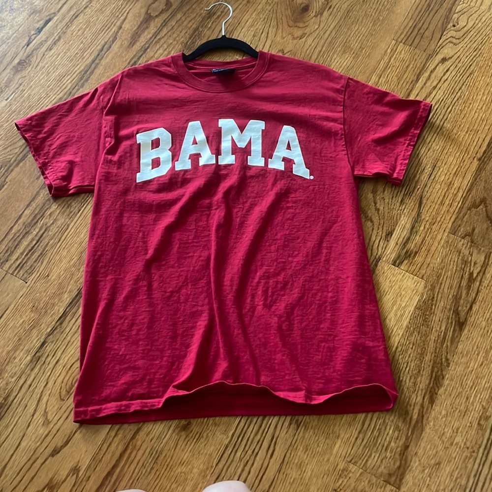 Brand is MV Sport. Never worn! Color is red with “BAMA” in white.
